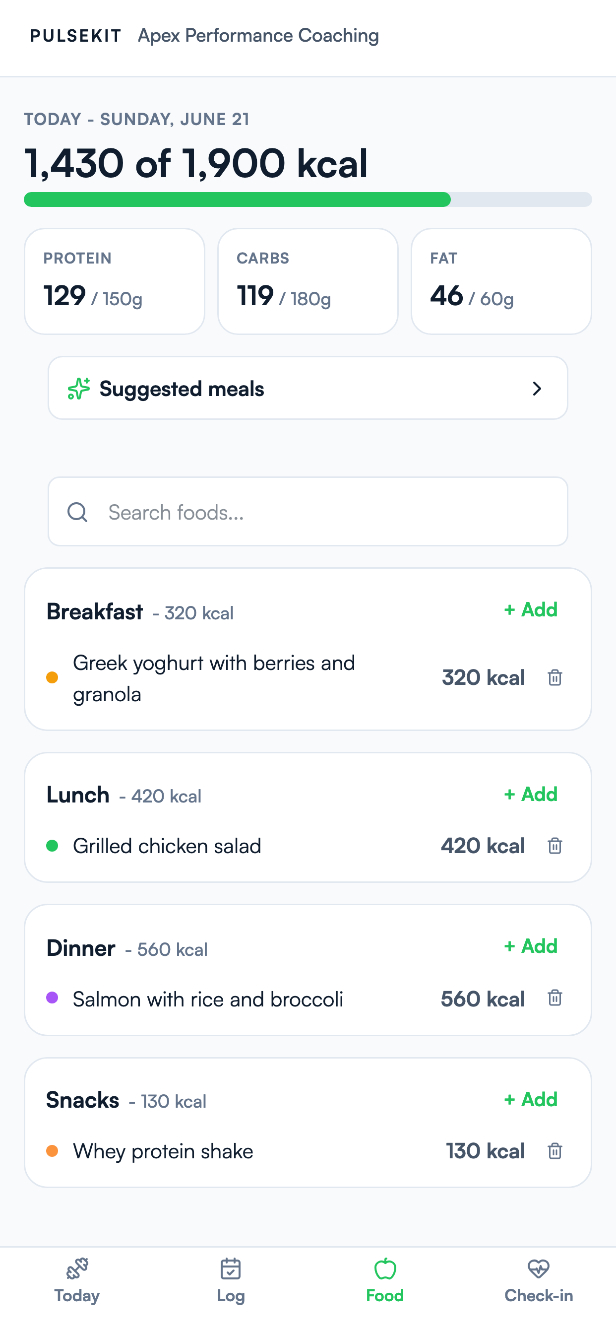 PulseKit food diary in the client app: daily calories against target, the protein, carbohydrate, and fat split, and logged meals by breakfast, lunch, dinner, and snacks